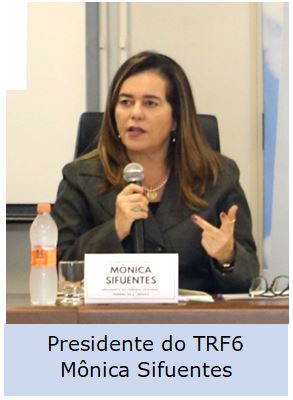 foto de perfil mulher branca roupa preta em uma mesa falando ao microfone. Presidente TRF6 Mônica Sifuentes