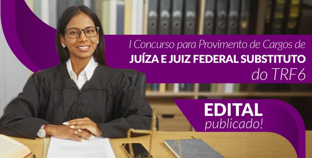 A imagem é um banner digital para o I Concurso para Provimento de Cargos de Juíza e Juiz Federal Substituto do TRF6. O banner tem um fundo roxo e mostra uma juíza sorridente, de óculos e vestindo uma toga, sentada em uma mesa.

Ao lado dela, o texto em branco anuncia o concurso e, no canto inferior direito, uma faixa roxa destaca que o EDITAL foi publicado.